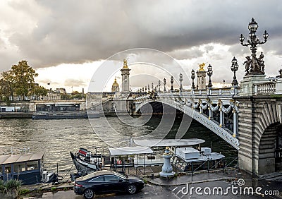 Scenic Alexander III bridge with ornate light posts and sculptures, Paris Editorial Stock Photo