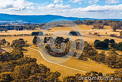 Australian countryside with winding road. Stock Photo
