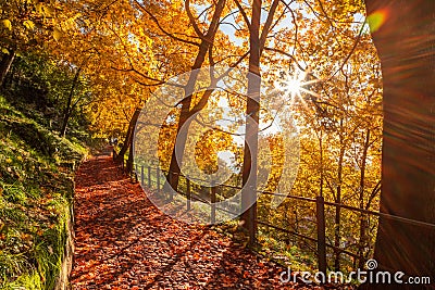 Scenic autumn road leading to the castle of Brescia. Lombardy, italy Stock Photo