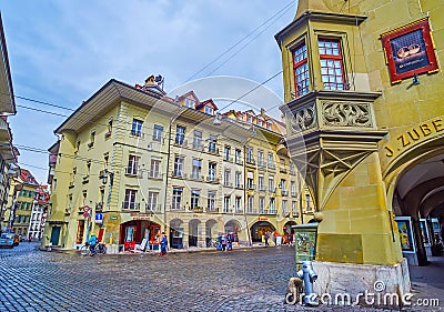 Scenic balcony and the arcades of the medieval townhouse on the crossroad of Kramgasse and Hotelgasse, Bern, Switzerland Editorial Stock Photo