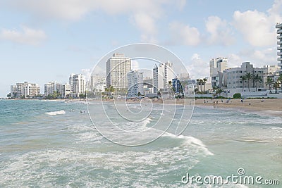 Scenic beach with white buildings on the shore of the ocean Editorial Stock Photo