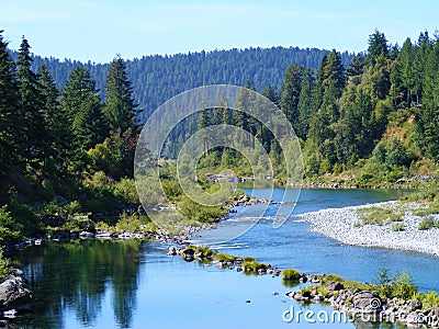 SCENIC BLUE TWISTING OREGON RIVER Stock Photo