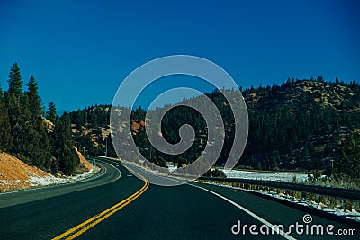 Scenic byway on Highway 14 through Cedar Canyon toward Cedar Breaks and Bryce Canyon National Park Editorial Stock Photo