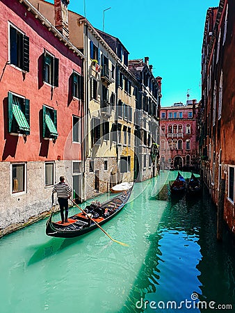 Scenic canal with gondola, Venice, Italy Editorial Stock Photo