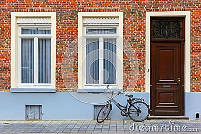 Scenic city view of Bruges street with bike Stock Photo