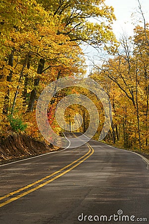 Scenic Drive through a fall forest Stock Photo