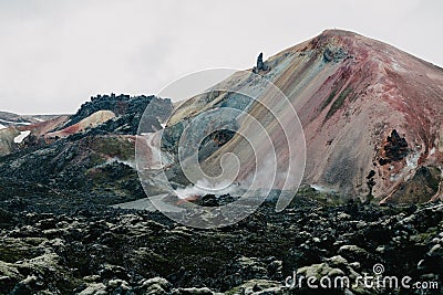 scenic icelandic landscape with magnificent rock formations and steam from hot springs, Stock Photo