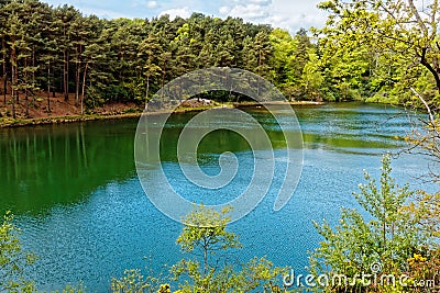 Scenic Lake and Woodlands at the Blue Pool, Dorset, England Stock Photo