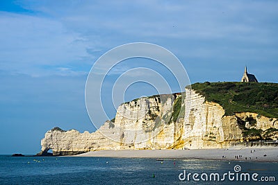 Landscape of Etretat cliffs, iconic landmark of Normandy Coast, Falaise d`Amont, on late afternoon, France Stock Photo