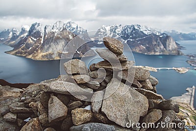 Scenic landscape of Lofoten islands: peaks, lakes, and houses. Reine village, rorbu, reinbringen Stock Photo