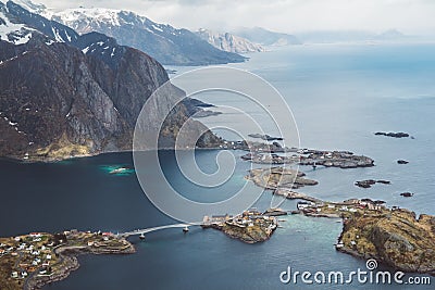 Scenic landscape of Lofoten islands: peaks, lakes, and houses. Reine village, rorbu, reinbringen Stock Photo