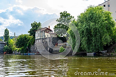 Scenic panorama cityscape view of Moldava river boat Prague in Czech Republic. Editorial Stock Photo