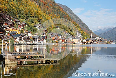 Scenic picture-postcard view of famous Hallstatt mountain village with Hallstaetter Lake in the Austrian Alps, region of Salzkamme Stock Photo