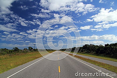 Scenic Road through Ocracoke Island Stock Photo