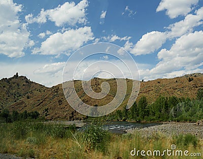 Roadside view of Wyoming landscape with the Soshone River along the North Fork Highway Stock Photo