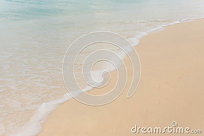 Scenic shot of foamy waves crashing the sandy shore, cool for background Stock Photo