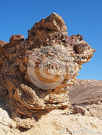 Scenic stratified orange rock in stone desert, Isr Stock Photo