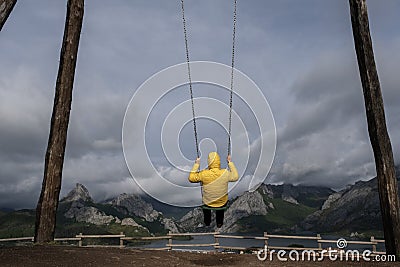 Scenic swing with views in the mountains Stock Photo