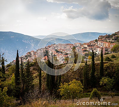 Scenic town with traditional ceramic tile rooftops surrounded by mountains, Arachova Boeotia Greece Editorial Stock Photo