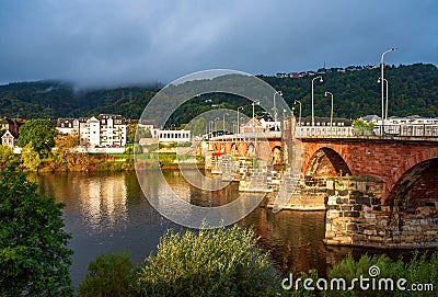 Scenic view of ancient Roman bridge illuminated by sun, Trier, Rhineland-Palatinate, Germany Stock Photo