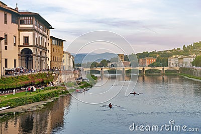 Scenic view of the Arno river, the main waterway of Tuscany region running through the medieval city of Florence in Italy Editorial Stock Photo