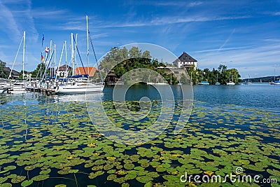 Scenic view of boats moored at a lake in Mattsee, Salzburg, Austria on a sunny day Stock Photo