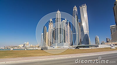 Scenic view of Dubai Marina Skyscrapers with boats , Skyline, View from sea, United Arab Emirates Editorial Stock Photo