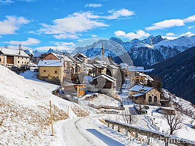 Scenic view on Guarda village at a beautiful sunny day in winter, Lower Engadine, Graubunden, Switzerland Stock Photo
