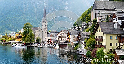 Scenic view of Hallstatt lakeside town in the Austrian Alps on beautiful day in autumn. Hallstatt, situated on Hallstatter See, a Stock Photo