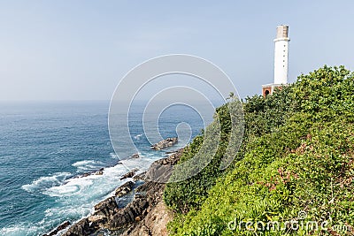 scenic view of lighthouse and blue sky on coastline, sri lanka, weligama Stock Photo