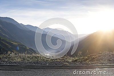 Scenic View Of Mountains Against Sky During Sunrise. Stock Photo