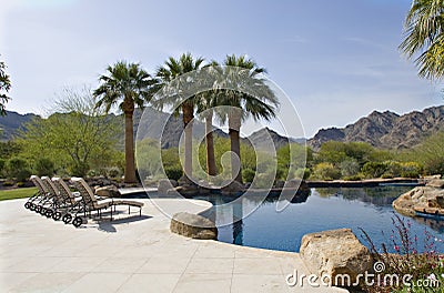 Scenic view mountains with swimming pool in foreground Stock Photo