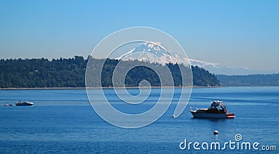 Scenic View of Mt. Rainier with Boats Stock Photo