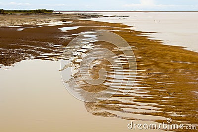 Scenic view of the Mudflats at Derby Wharf, Western Australia on a cloudy afternoon Stock Photo