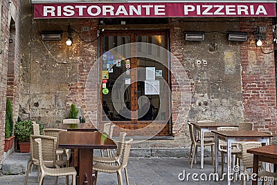 Scenic view of old pizzeria entrance in Siena, Italy Editorial Stock Photo