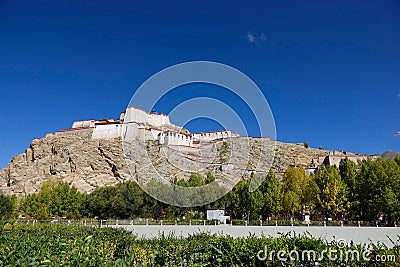 Scenic view of Pelkor Chode monastery overlooking the small city of Gyantse. Stock Photo