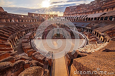 Scenic view of Roman Colosseum interior at sunset Stock Photo