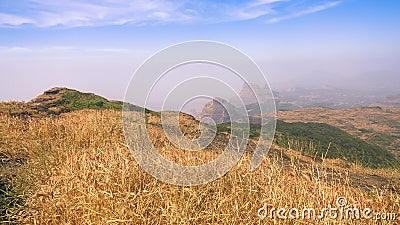 Scenic View Of Sahyadri Mountain Ranges Shot From Harishchandra Fort Stock Photo