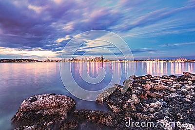 Scenic view of Seattle city in the night time with reflection of the water,Seattle,Washington,USA.. Stock Photo