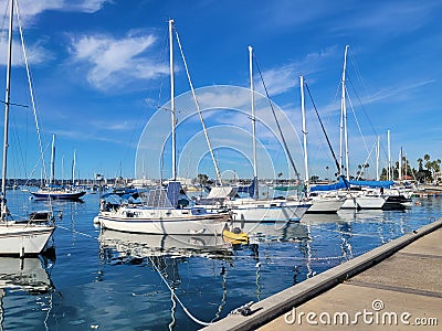 Scenic view of several yachts at San Diego Bay in wintertime on a bright, sunny day Editorial Stock Photo