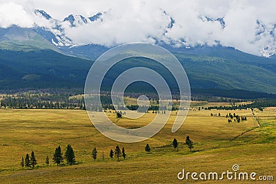 Scenic view of the snow-covered North-Chuya range in the Altai mountains in the summer, Siberia, Russia Stock Photo