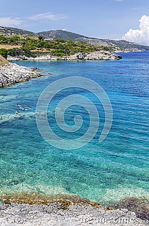 Scenic view on turquoise rocky beach situated on the north east coast of Zakynthos island, Greece. Stock Photo