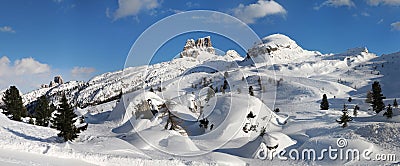 Scenic winter landscape at Passo Falzarego near Cortina d`Ampezzo. From left to right, Cinque Torri group, Averau and Col Gallina Stock Photo