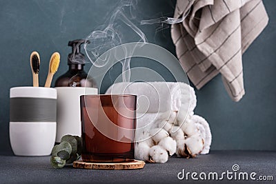 Scented candle and bathroom accessories Stock Photo