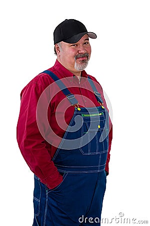 Sceptical man on overalls with a dubious look Stock Photo