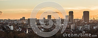 Schaerbeek, Brussels Belgium - Panoramic view of the Brussels skyline at dusk taken from the Saint Susanna catholic church Editorial Stock Photo