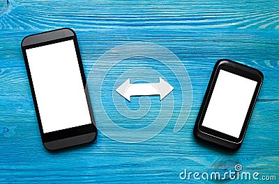 Mobile phones synchronization. Incoming and outgoing calls. Data backup. Stock Photo