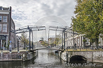 Schiedam canals, bridge and windmill Editorial Stock Photo
