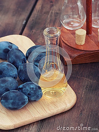 Schnapps and plums Stock Photo