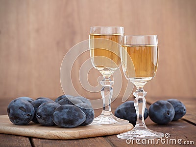 Schnapps and plums Stock Photo